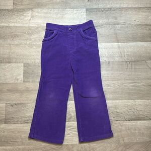 Girls Purple Corduroy Jeans. Garanimals size 5T. 2 front pockets.​